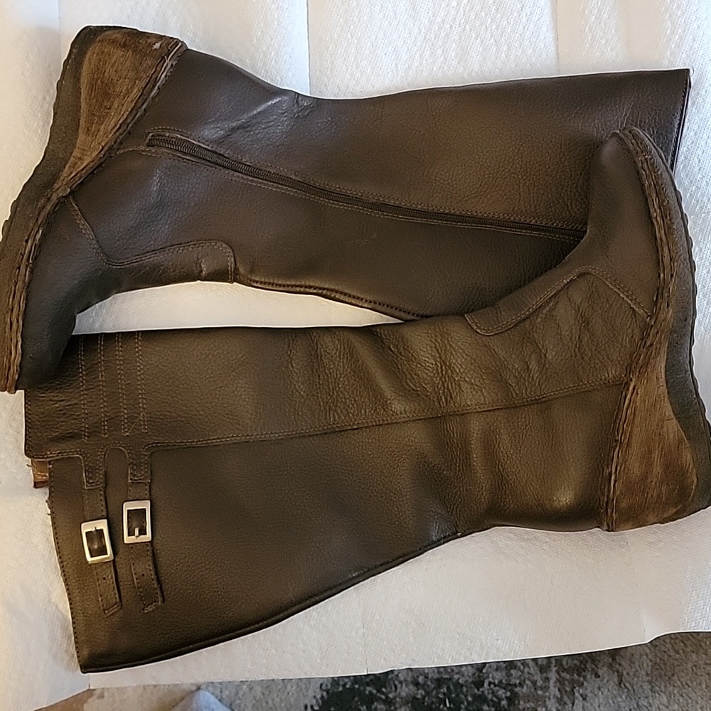 Brown leather wedge boots.Wide calf, side zipper.